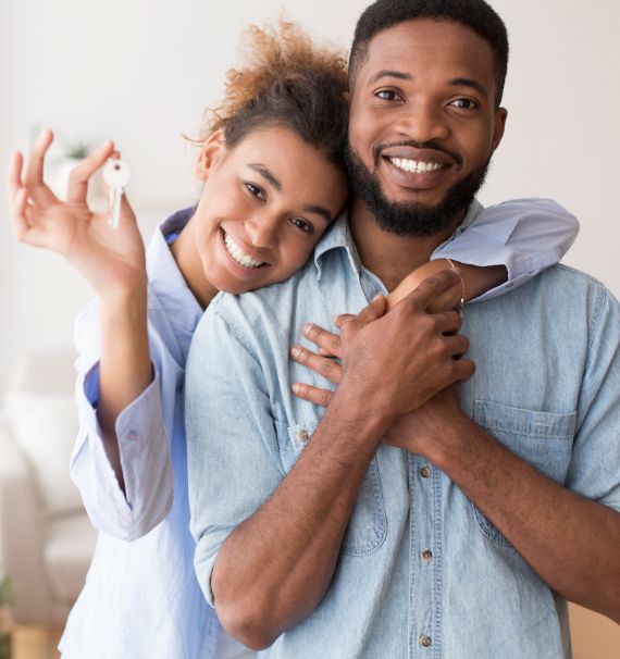 couple holding keys